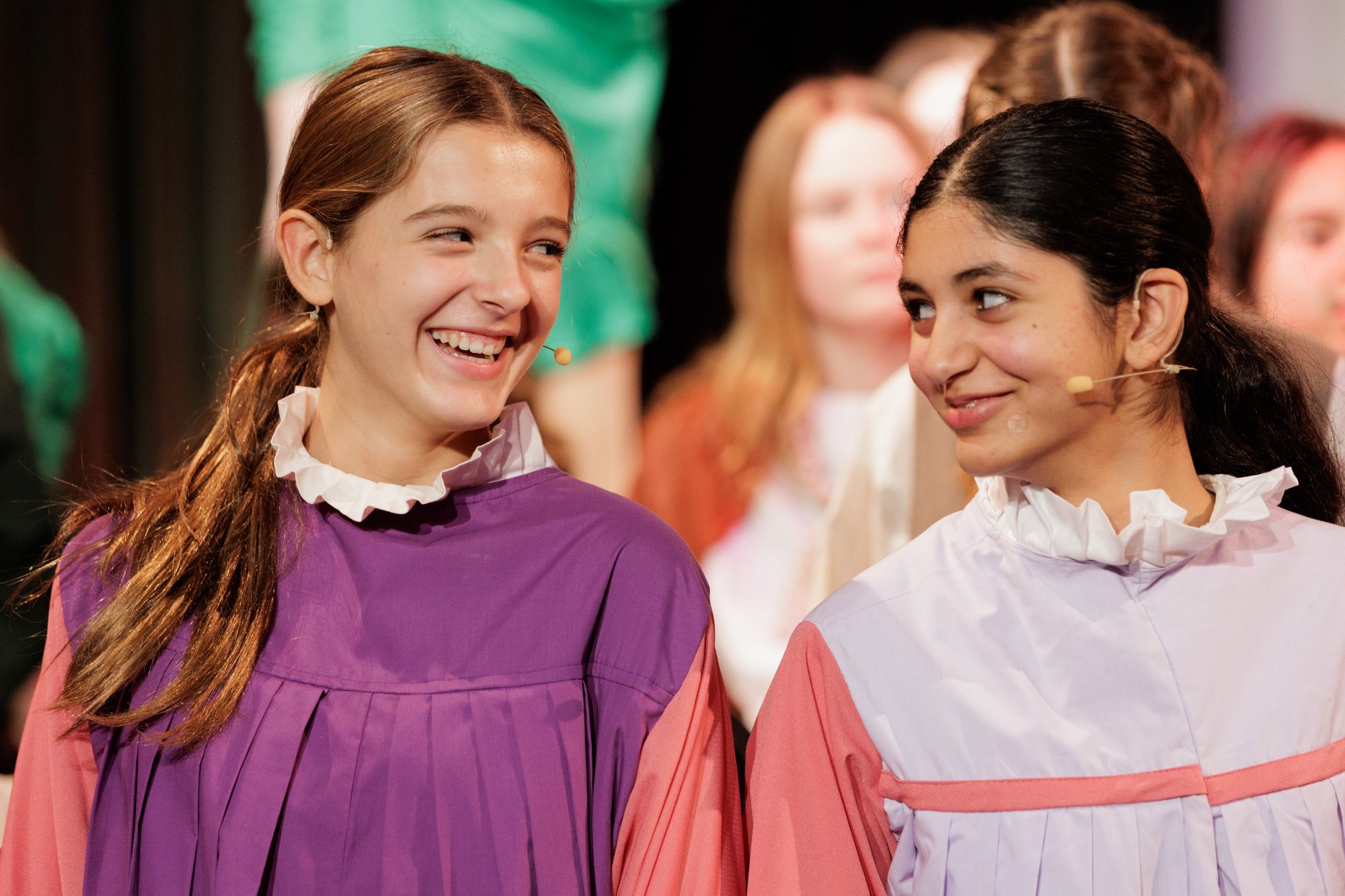 Two Queen's College students performing a play